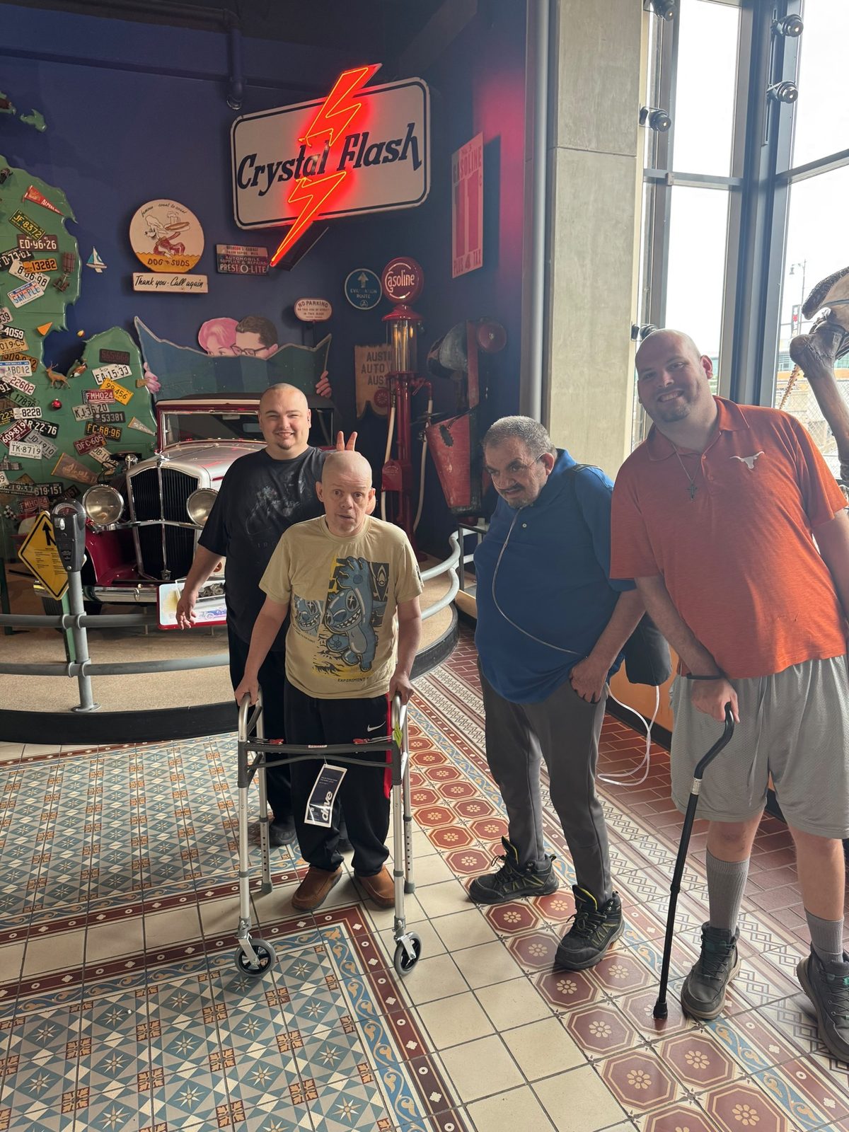 A group posing together during a museum visit