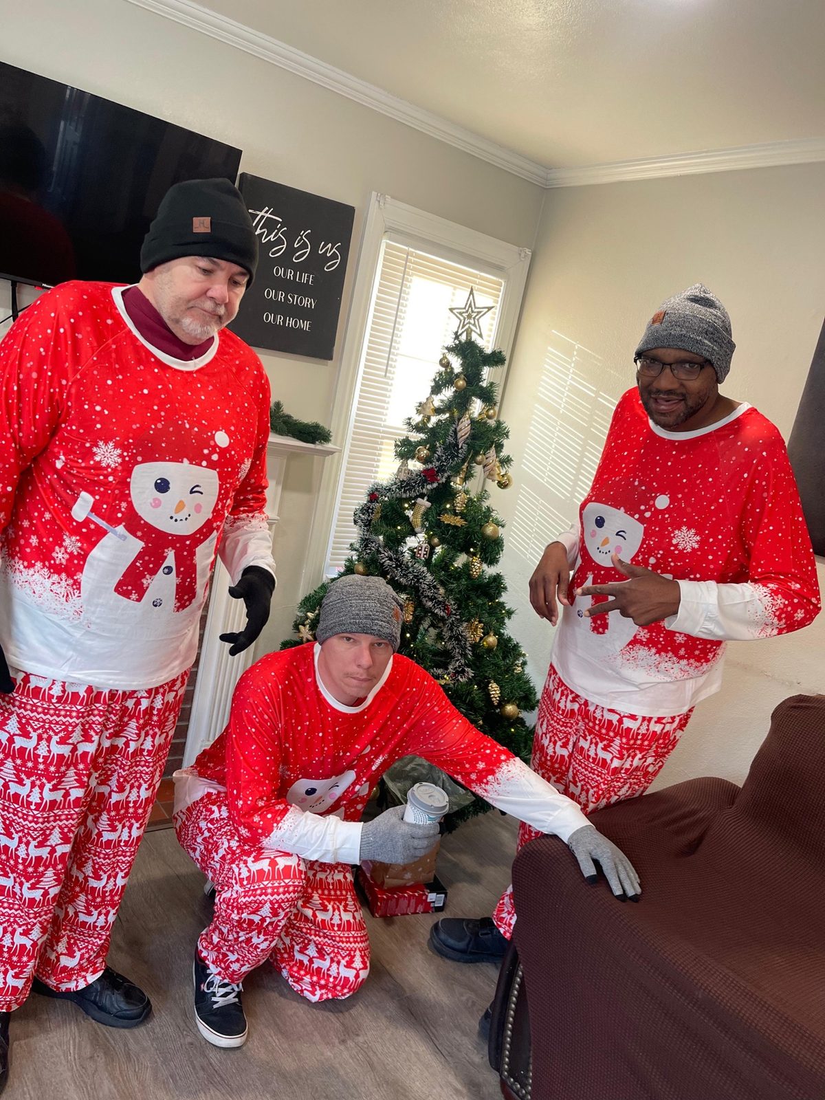 Members of the Giddings AFC community celebrating in matching Christmas pajamas