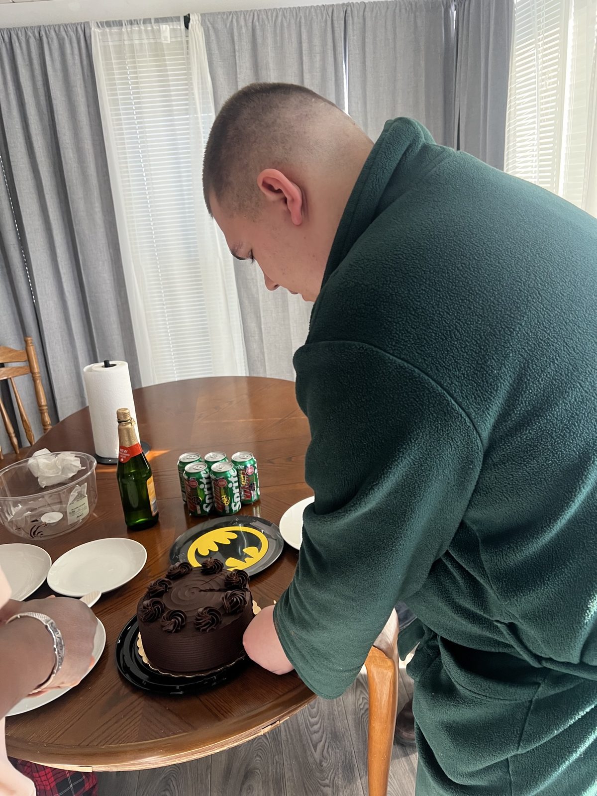 A Giddings AFC resident celebrating with a birthday cake